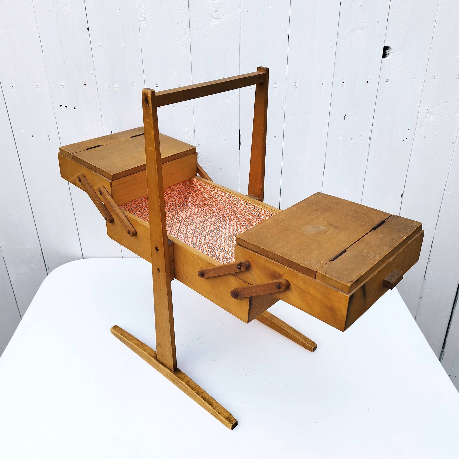 Old wooden folding sewing box
