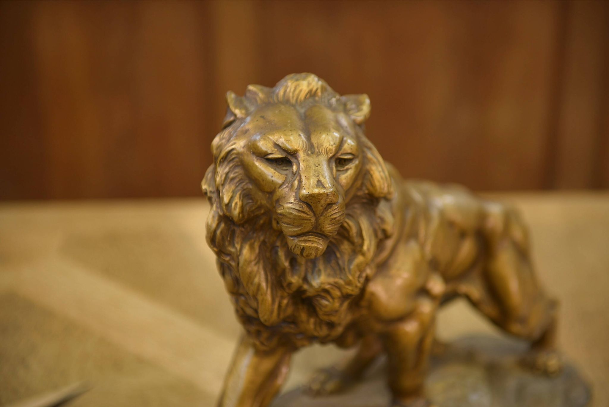 Sculpture of a lion in patinated terracotta by A. Fagotto, 1930s.
