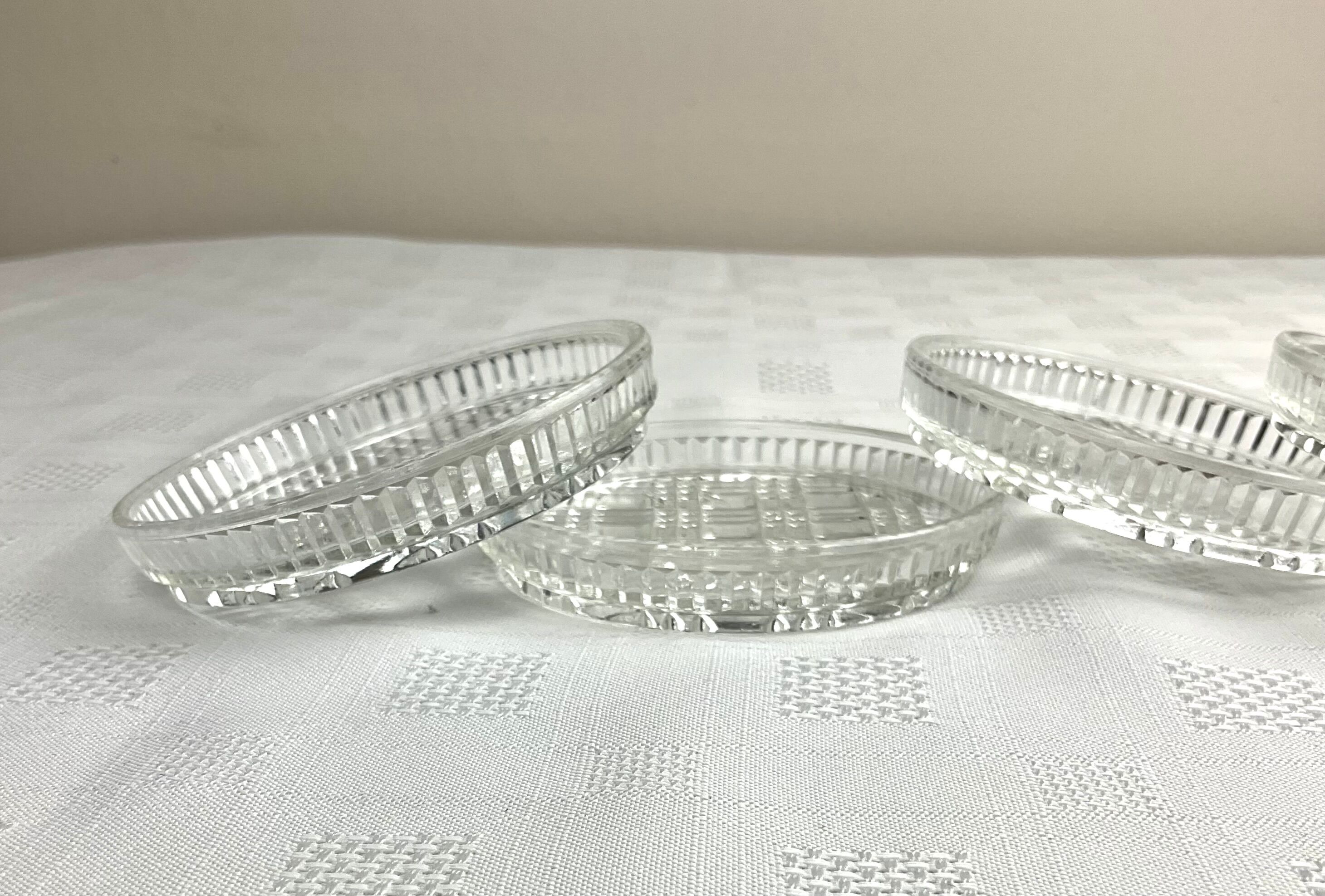 Series of 4 vintage glass coasters