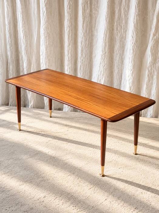 Mid-century modern teak coffee table with brass feet, Sweden circa 1960