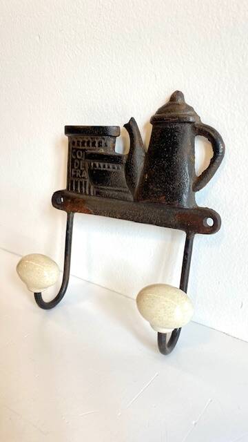 Coat rack made of steel and porcelain