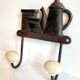 Coat rack made of steel and porcelain