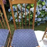 4 vintage Roche Bobois chairs from the 80s in beech with woven seats in blue fabric.