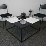 Square coffee table has checkered 80s