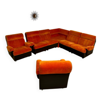 Modular vintage orange corner sofa, 1970s pop design.