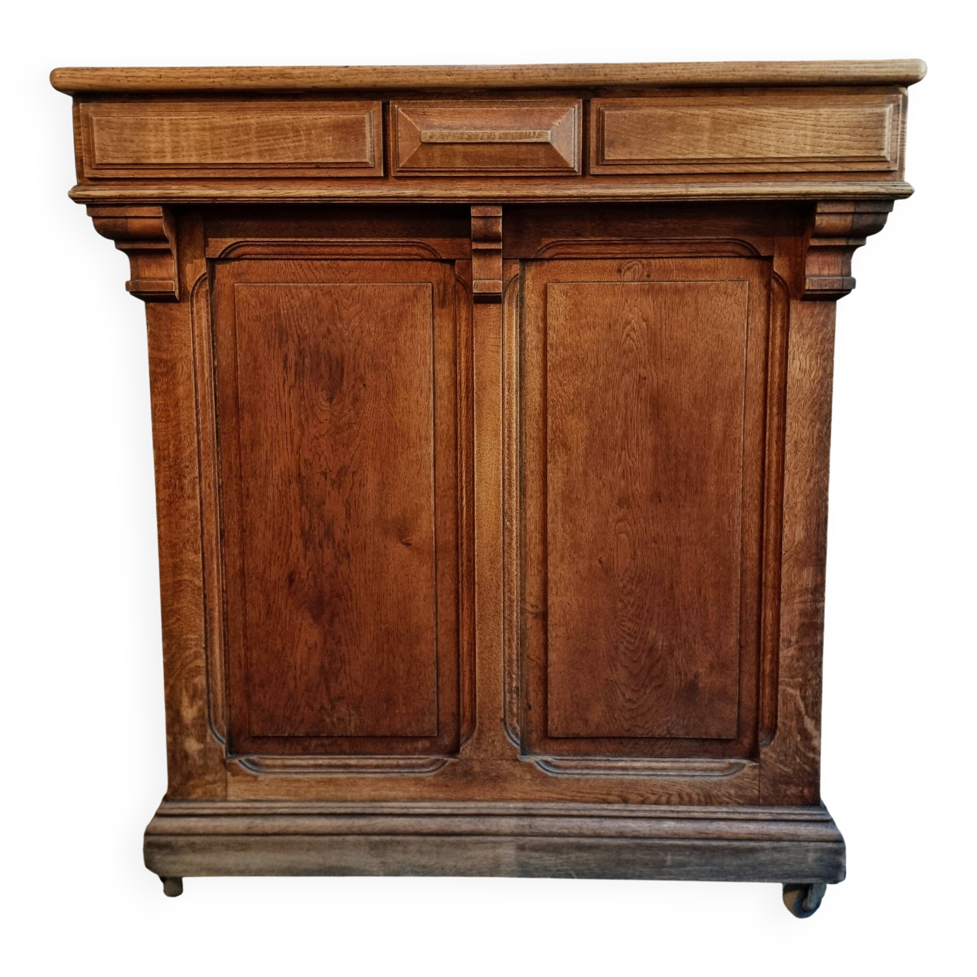 Antique French oak shop counter, kitchen island on wheels, circa 1880–1900.