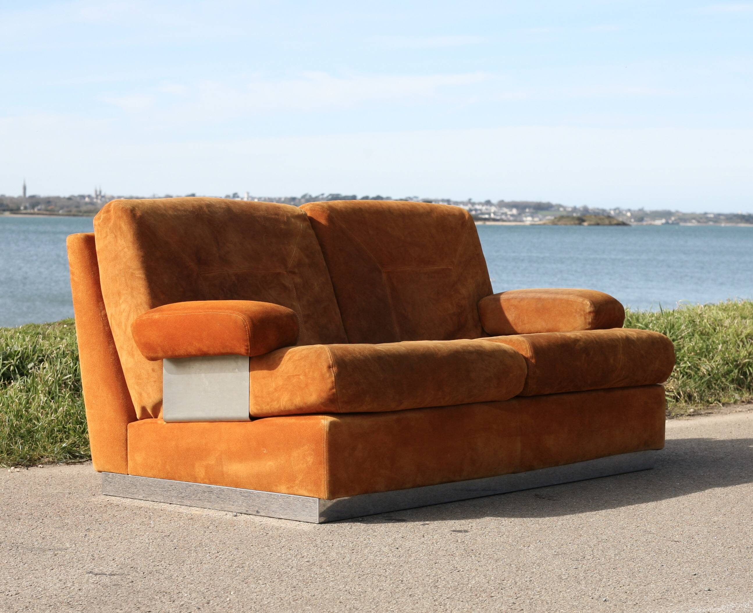 Orange suede leather and steel sofa. Circa 1970