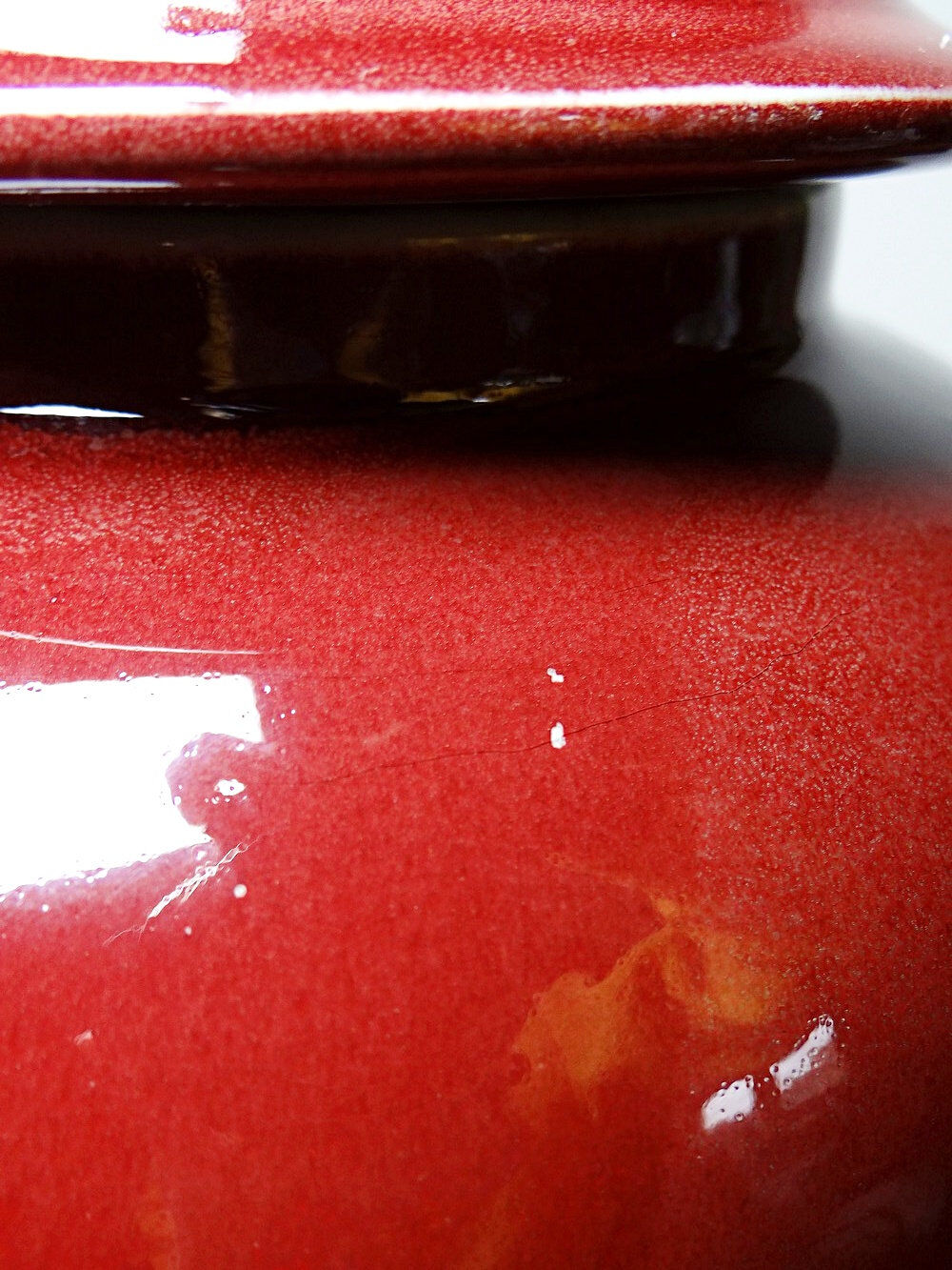 Covered vase, Chinese ginger jar in oxblood and celadon ceramic.