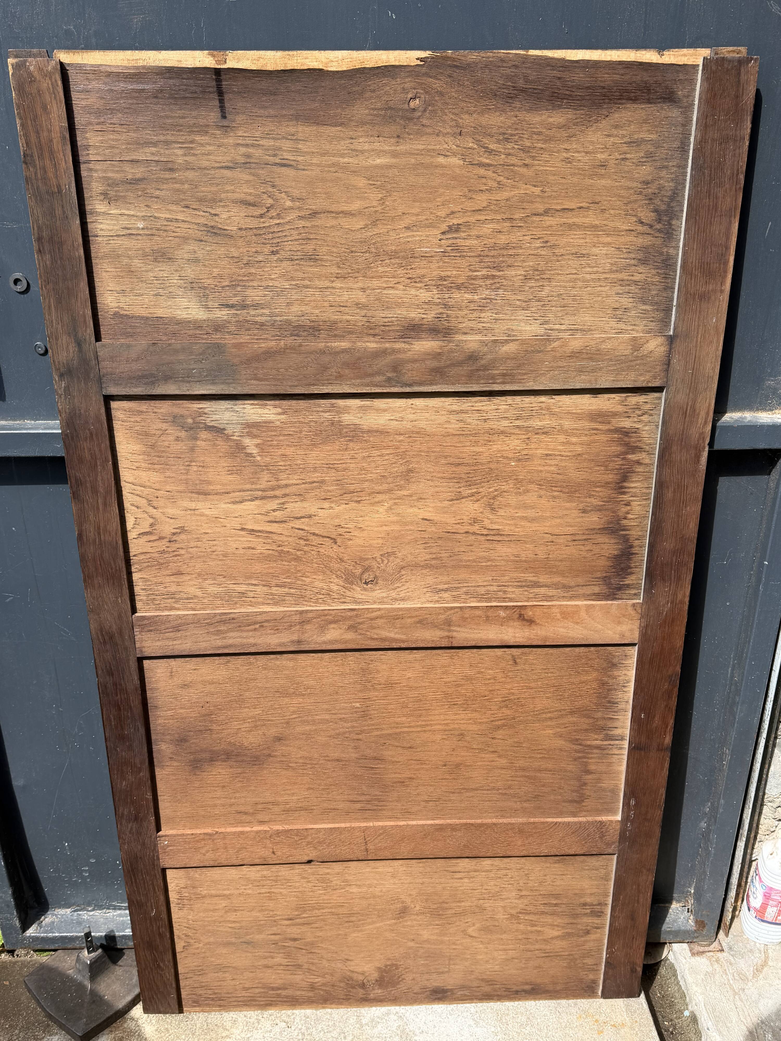 Art deco wardrobe in raw oak with bevelled mirror.