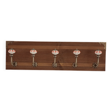 Vintage wall coat rack with 5 ceramic hooks featuring floral patterns - wood