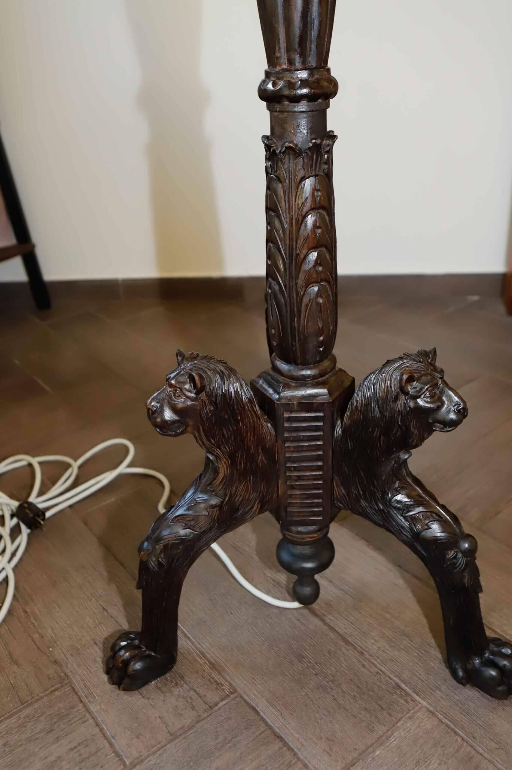 Antique floor lamp with lion motif