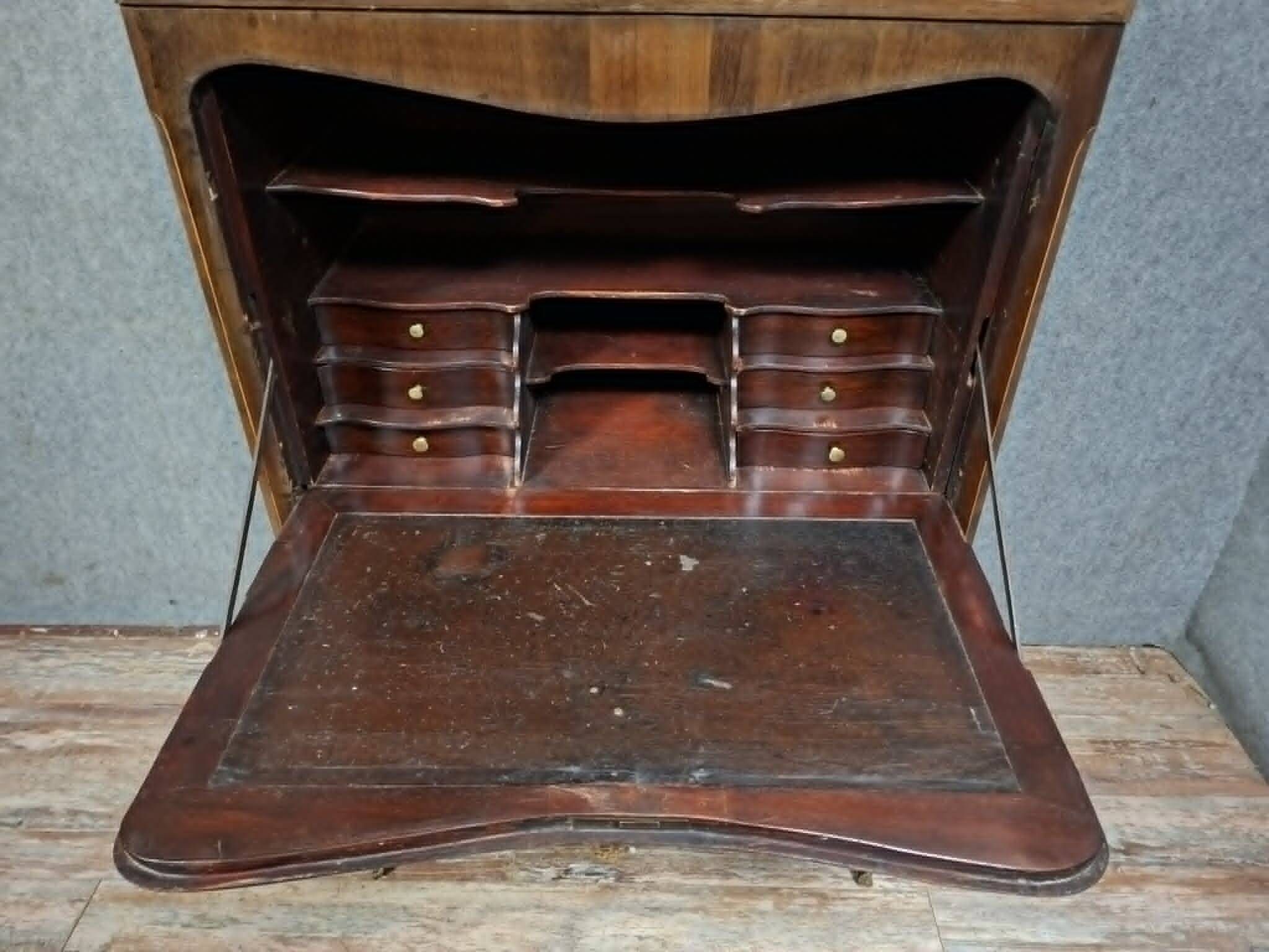Louis XV period secretary in marquetry and veneer, 18th century.