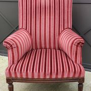 Old armchair and its Louis XVI style footrest/velvet covering
