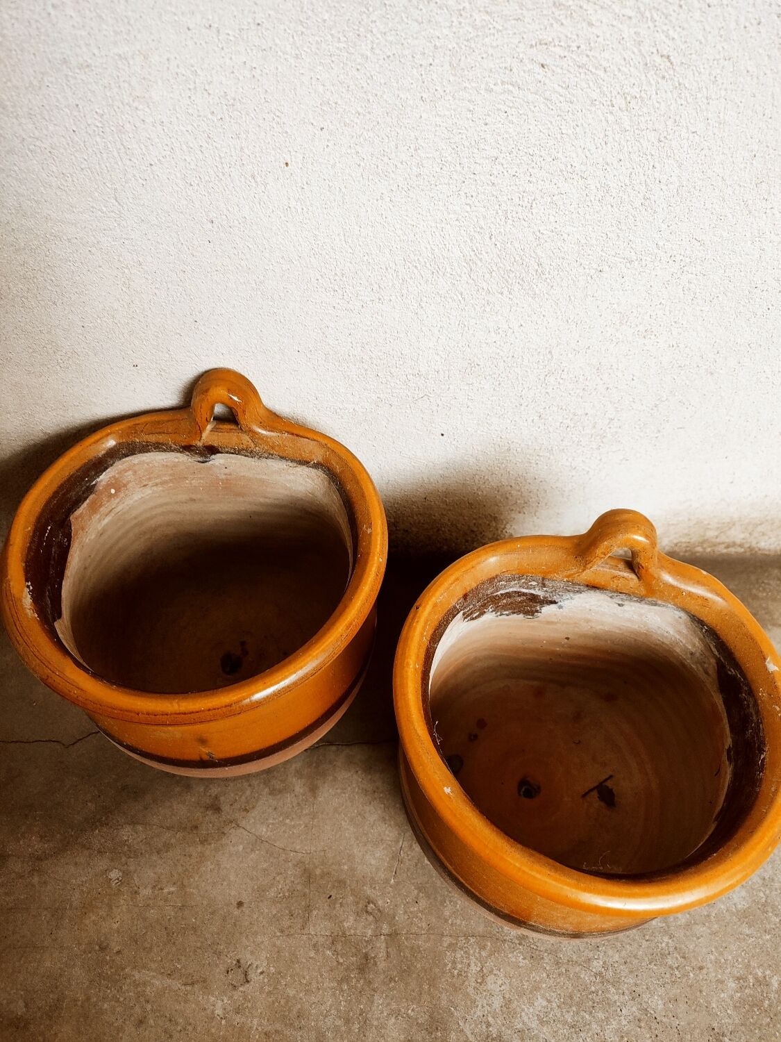 Duo of glazed terracotta pots