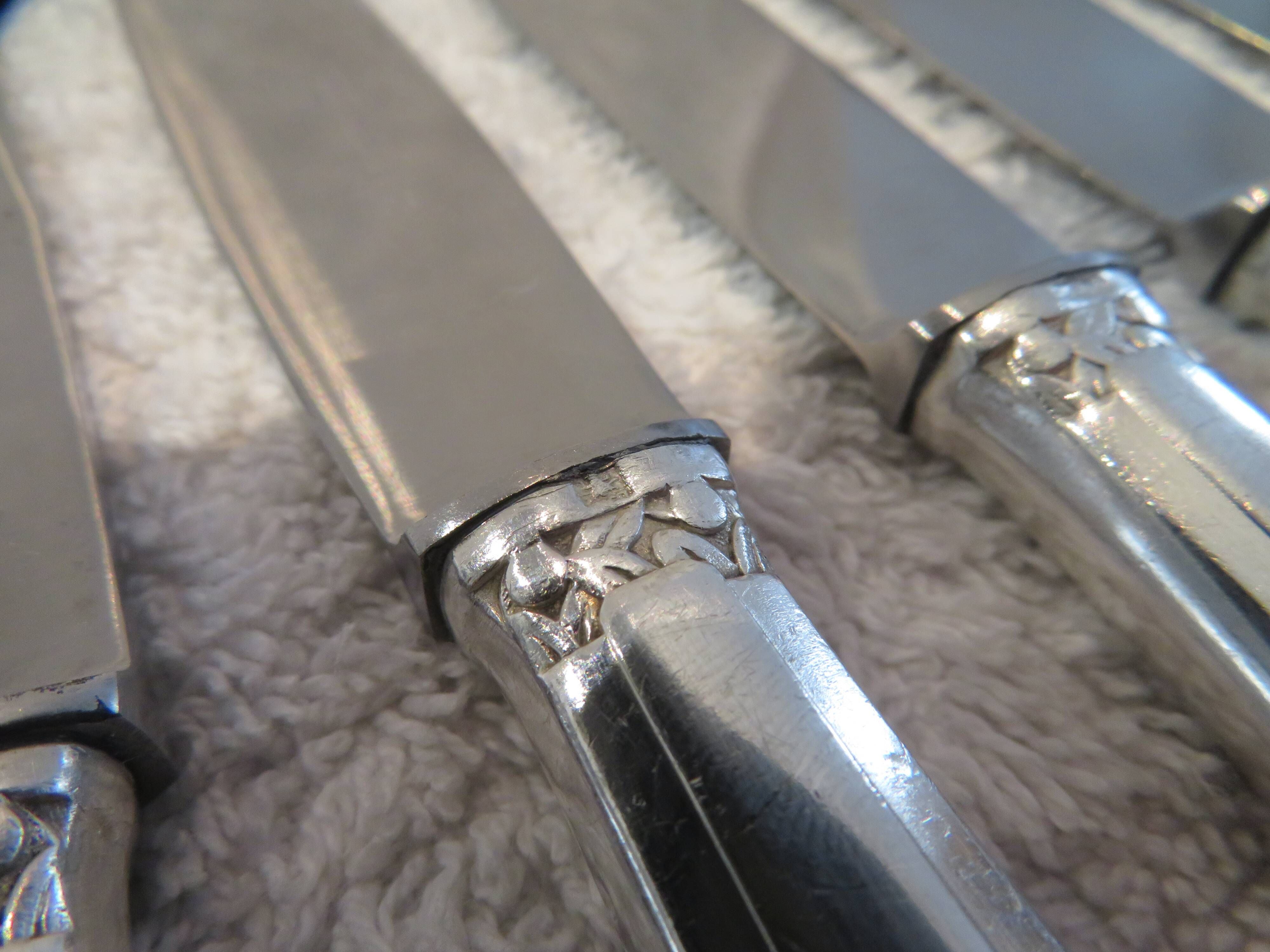 12 silver-plated dessert knives by Argit goldsmith? Art Deco floral bands