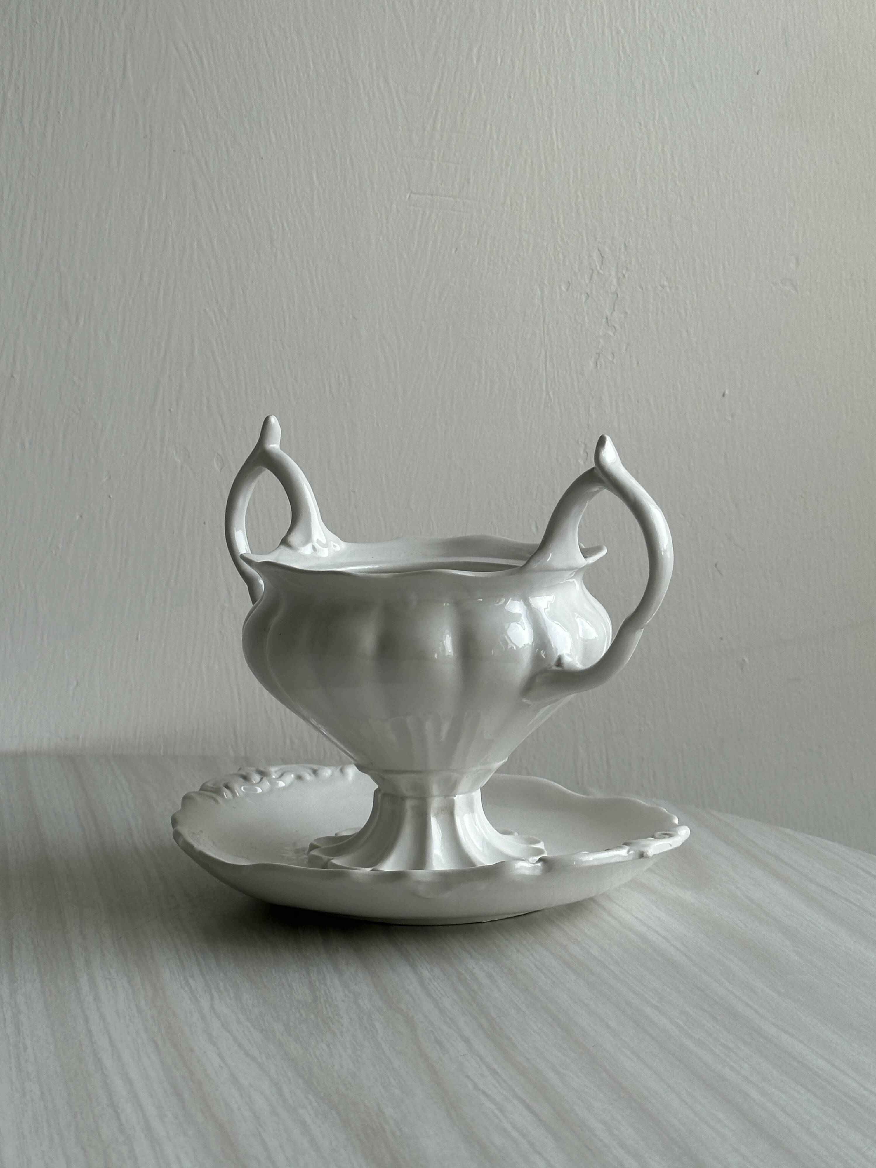 Antique white porcelain sauce boat