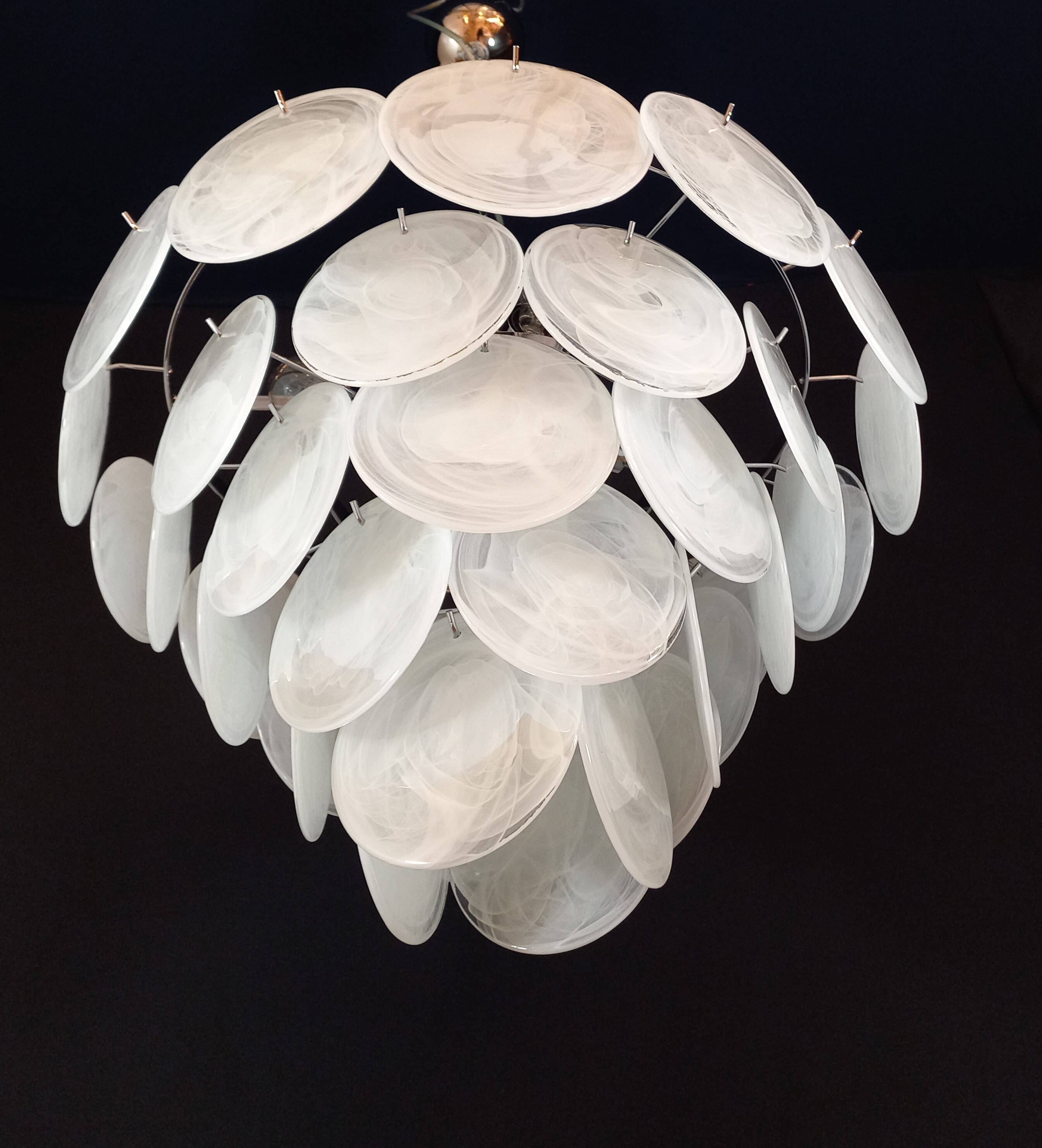 Handcrafted chandelier with Murano glass and handmade alabaster discs.