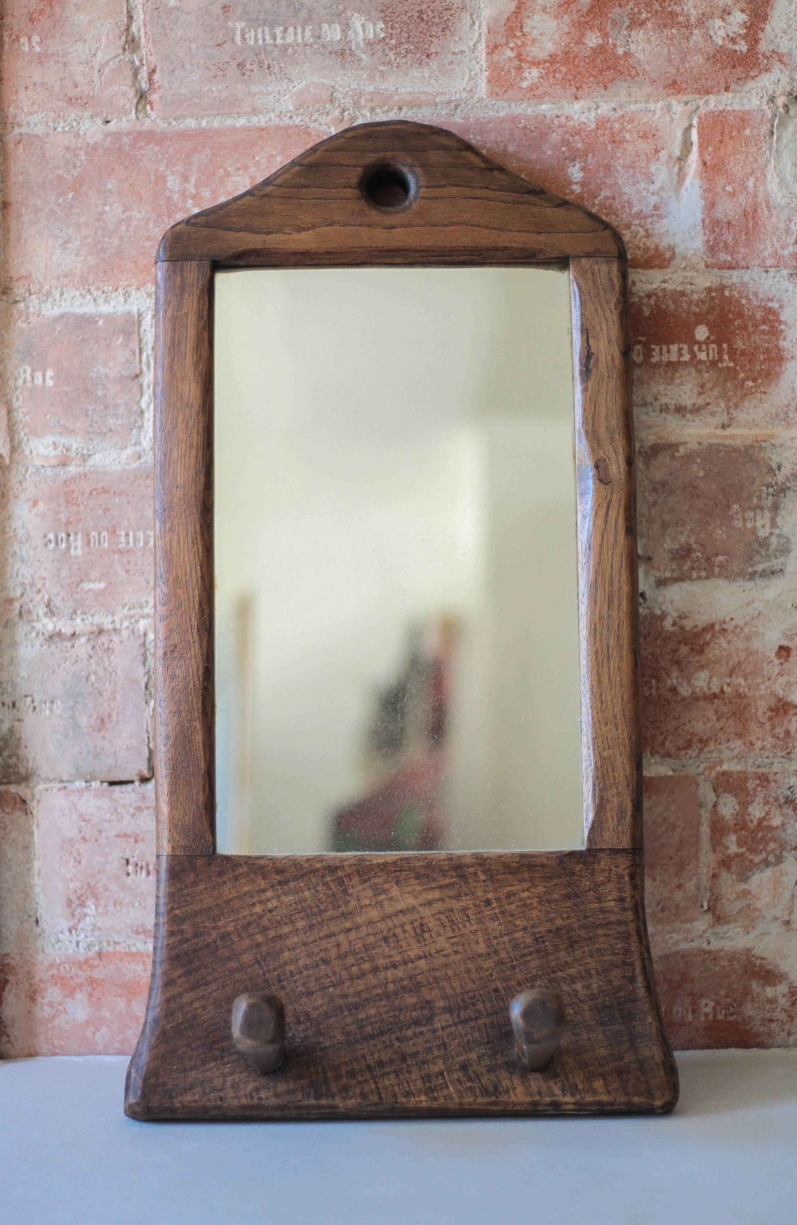 Wall-mounted coat rack mirror with solid wood hooks, brutalist mirror.