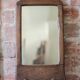 Wall-mounted coat rack mirror with solid wood hooks, brutalist mirror.