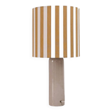 Sandstone lamp and striped lampshade