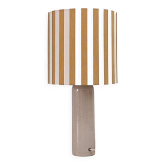 Sandstone lamp and striped lampshade