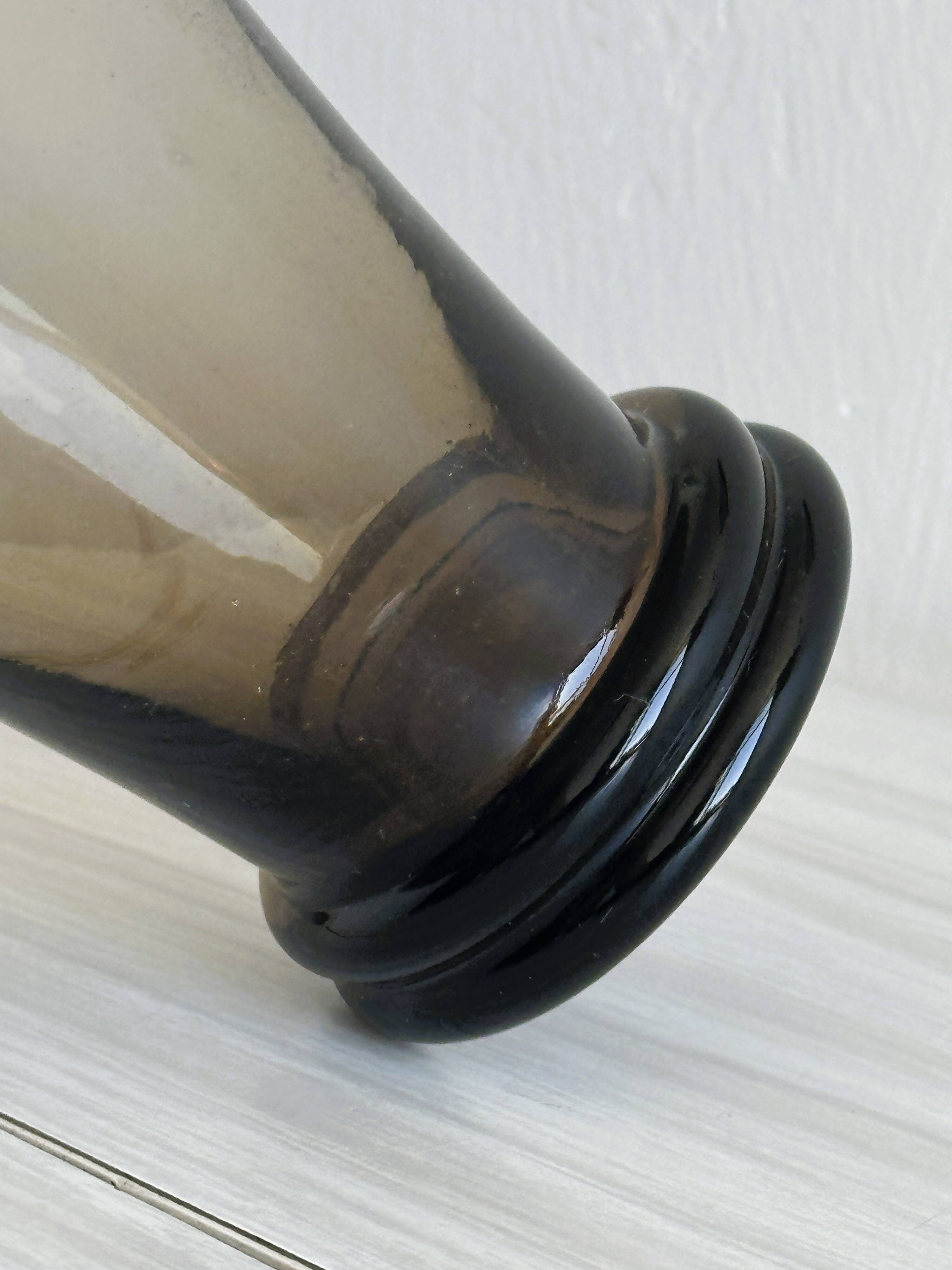 Smoked glass bottle, sculpted stopper