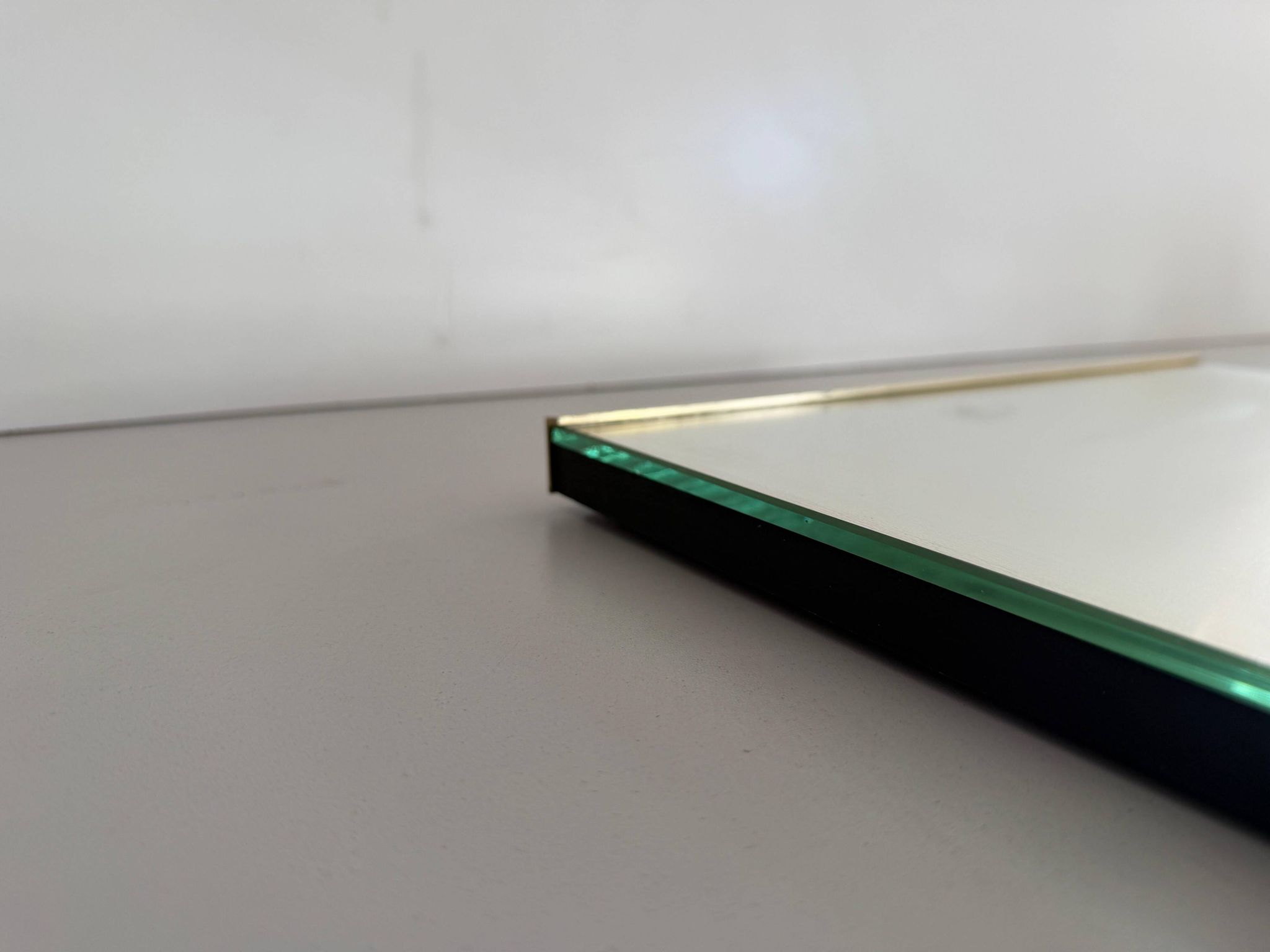 Minimalist rectangular wall mirror with a brass frame, 1960s, Germany