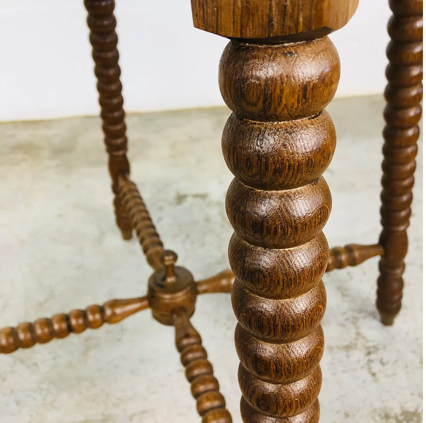 Carved antique wooden table with 8 sides