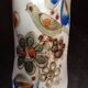 Ken edwards pottery - stylized horse decorated with butterfly flowers bird