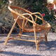 Fauteuil rotin coquille années 60