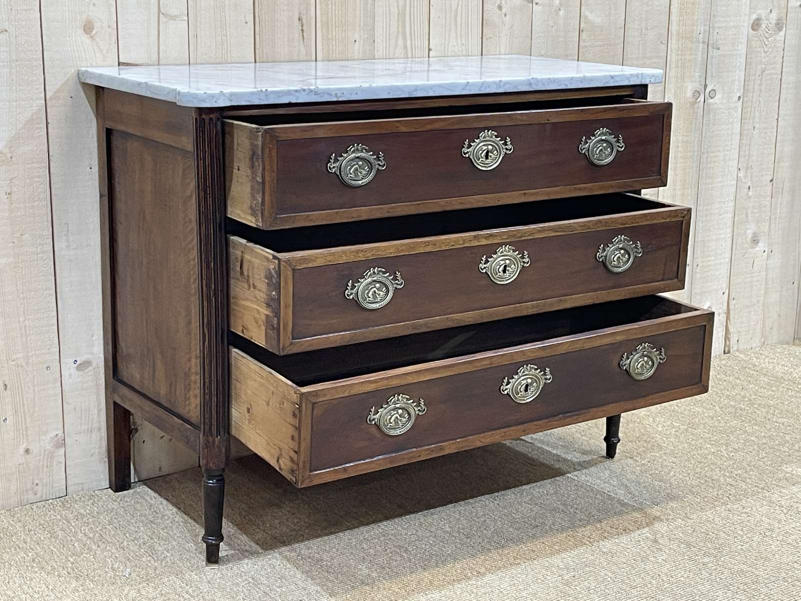 Louis XVI XIXth chest of drawers in mahogany and walnut and white marble top
