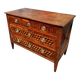 Louis XVI commode with marquetry featuring a design of precious wood cubes, 18th century.