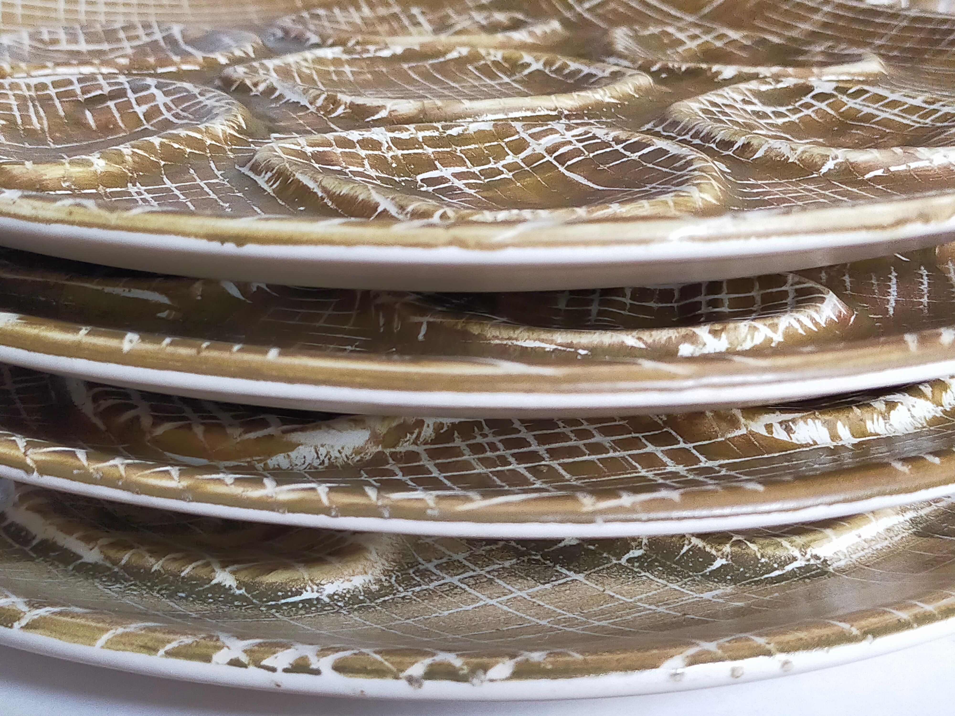 Six oyster plates earthenware with matte enamel, 50s