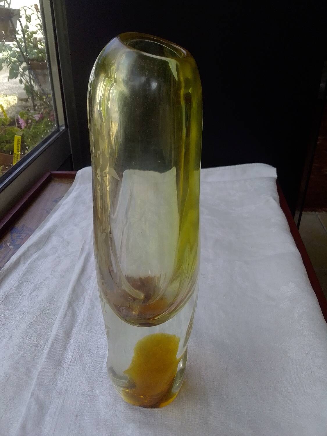 Amber-colored engraved crystal vase