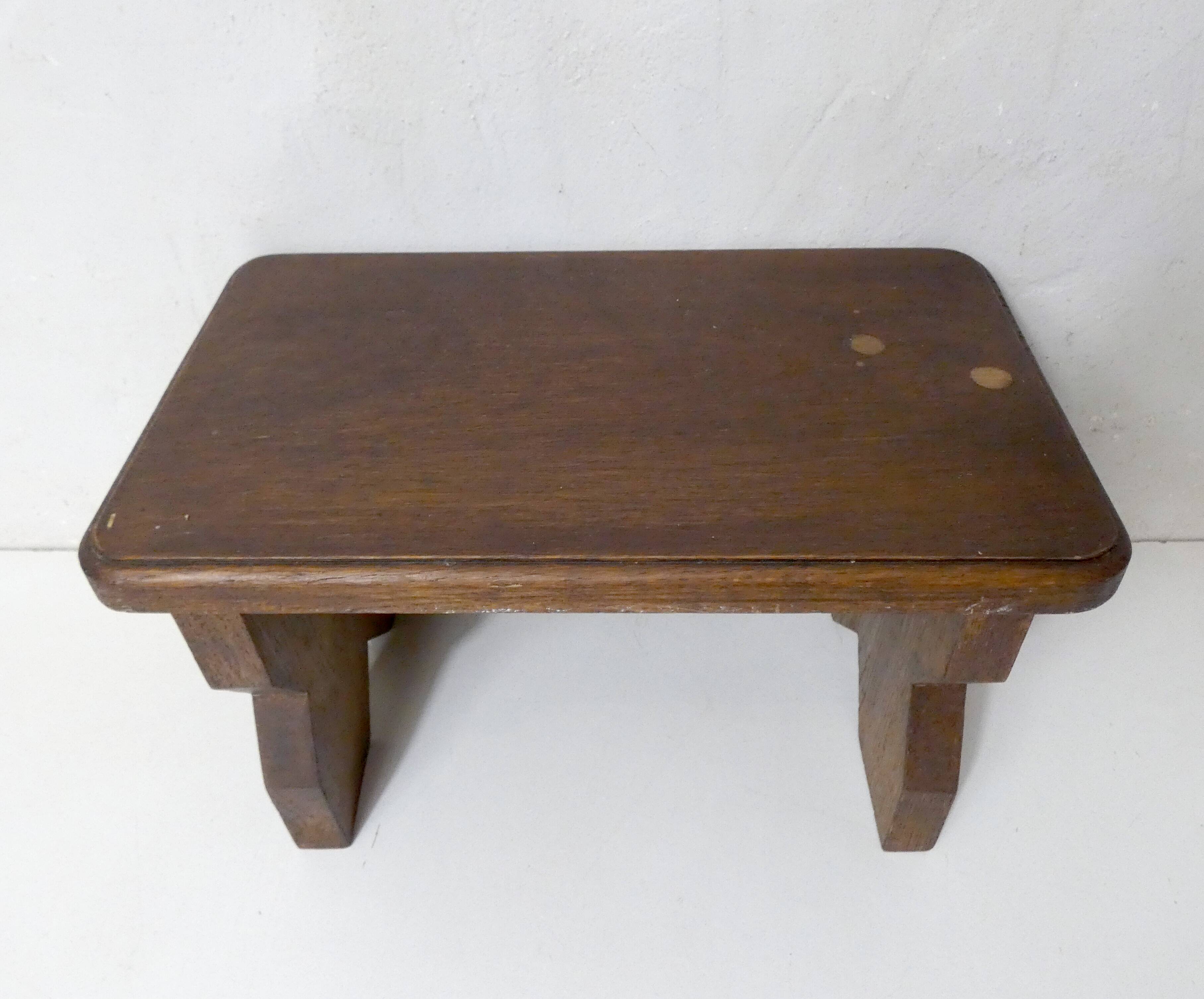 Old small bench in solid oak wood vintage step stool