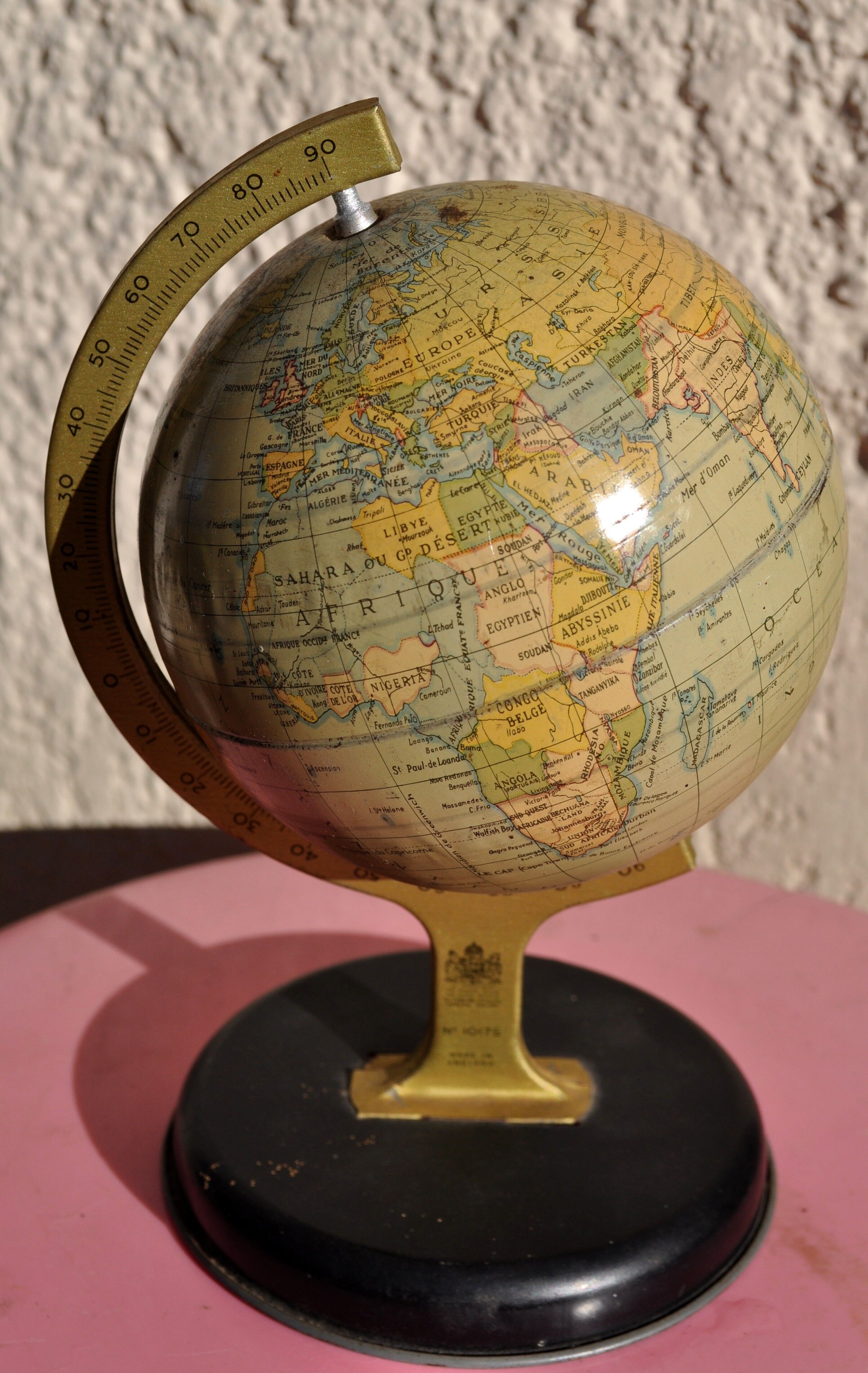 Small vintage metal globe