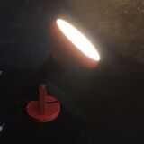 Vintage wall lamp in orange metal and black plastic, adjustable