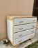 Large commode in renovated white and wood Atelier style.