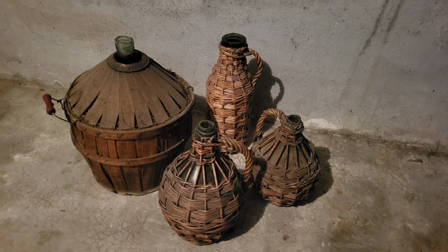 Set of 4 old demijohn carboys