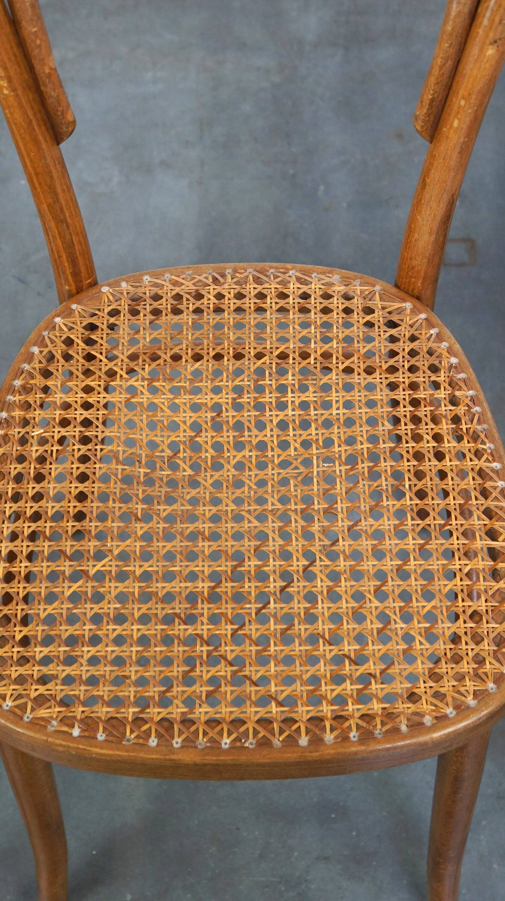 Lovely set of 2 brown vintage bistro chairs with woven seats
