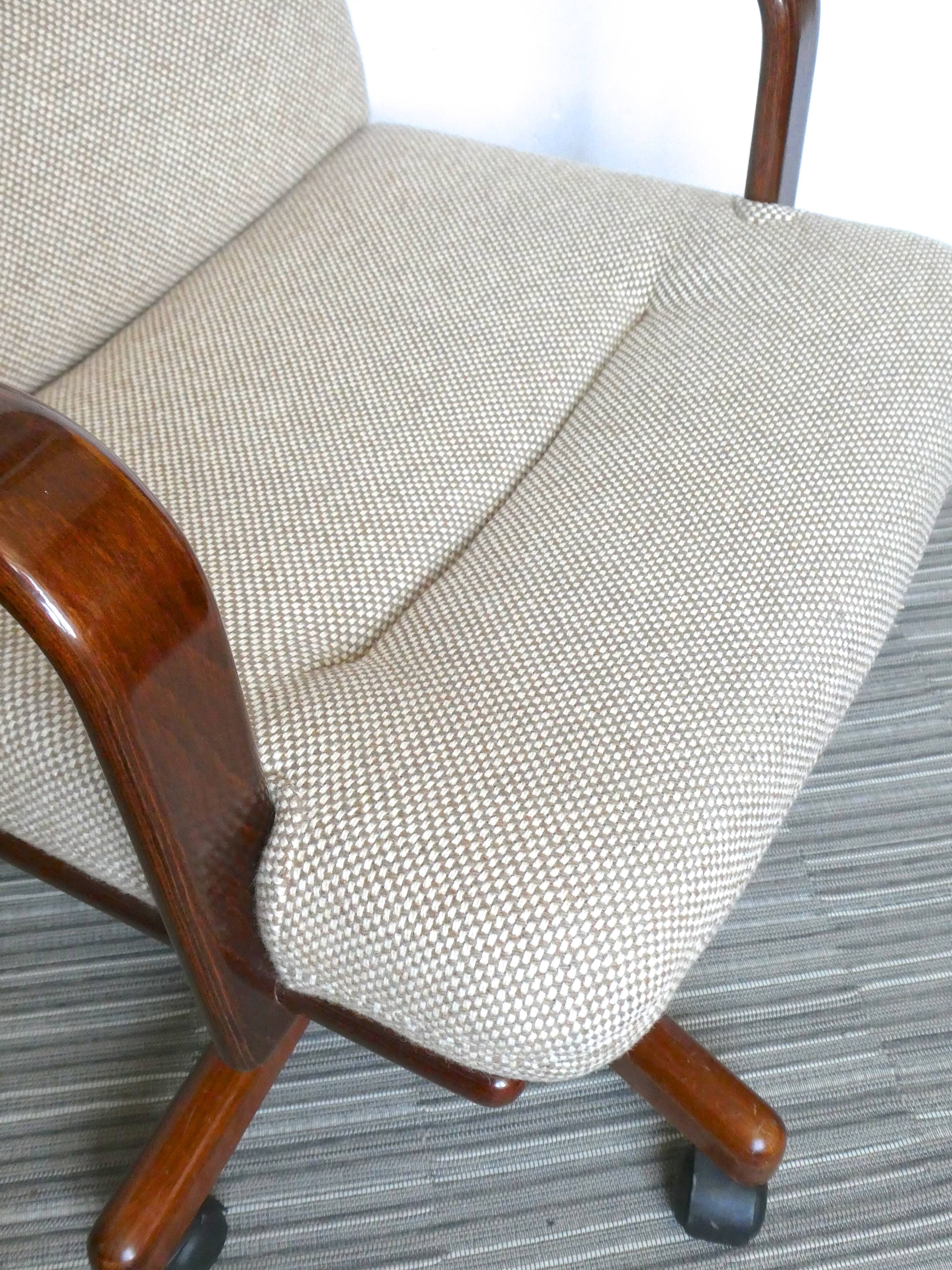 Desk chair in wood and fabric of the 1980s