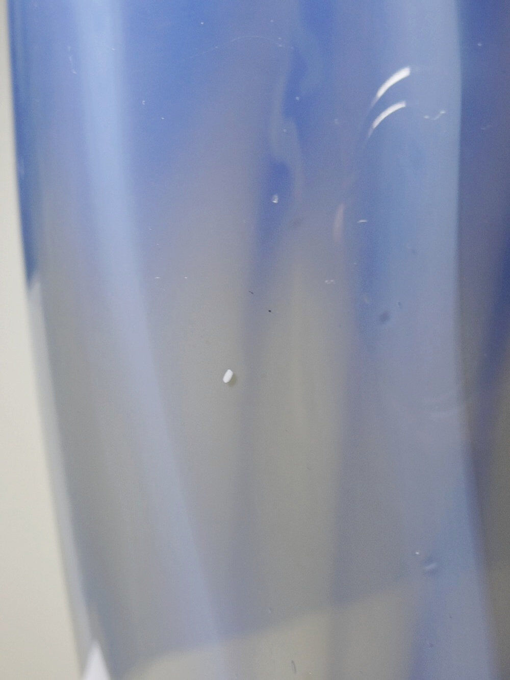 Vintage smoked glass vase lined with opaline, Murano bubble.