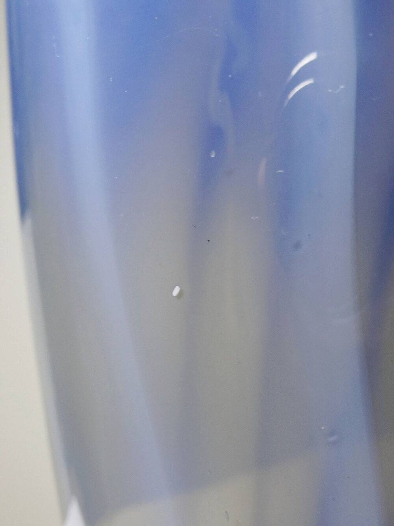 Vintage smoked glass vase lined with opaline, Murano bubble.