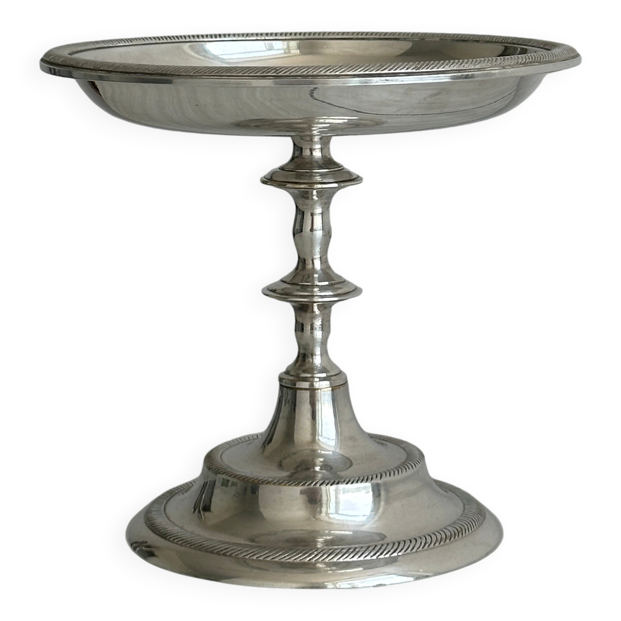 Silver-plated metal stand.