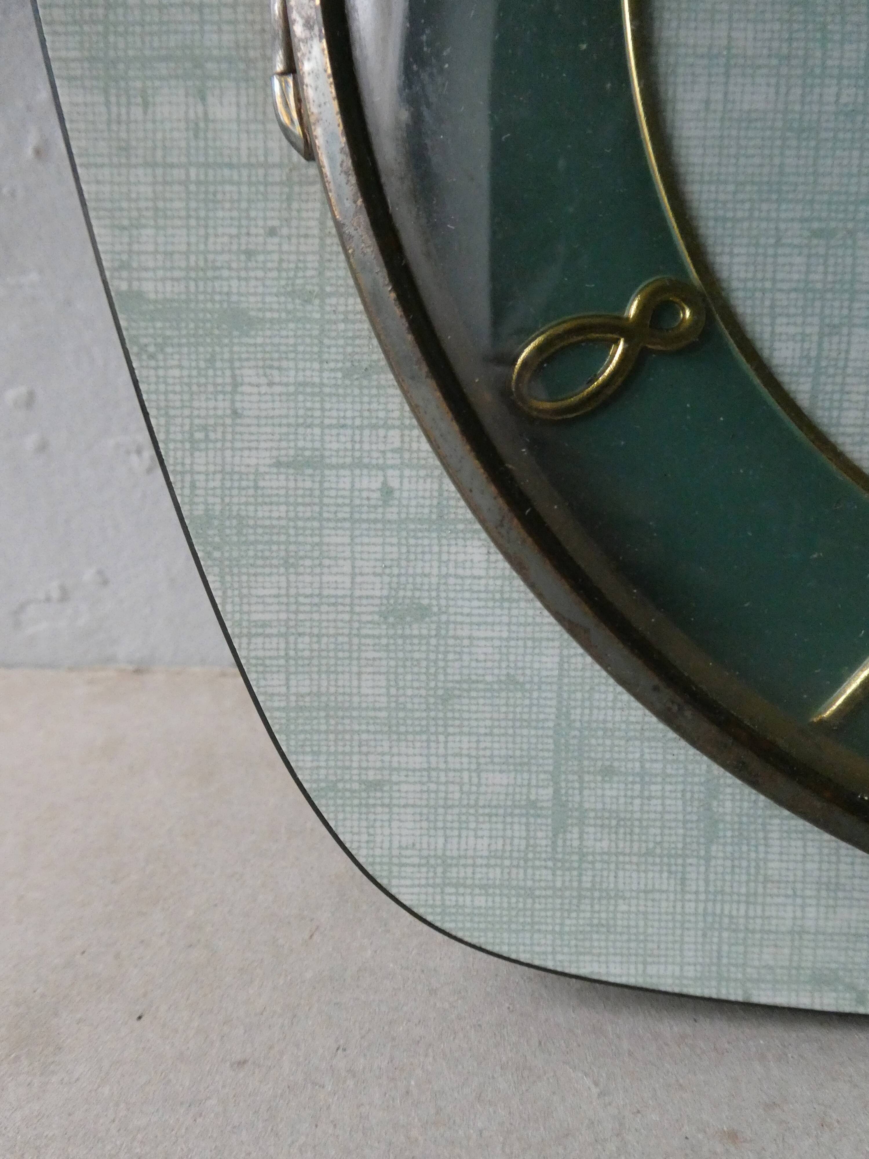 Pendulum wall clock Lutetia in green formica of the 1950s