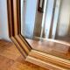 Miroir octogonal nervuré en bois doré