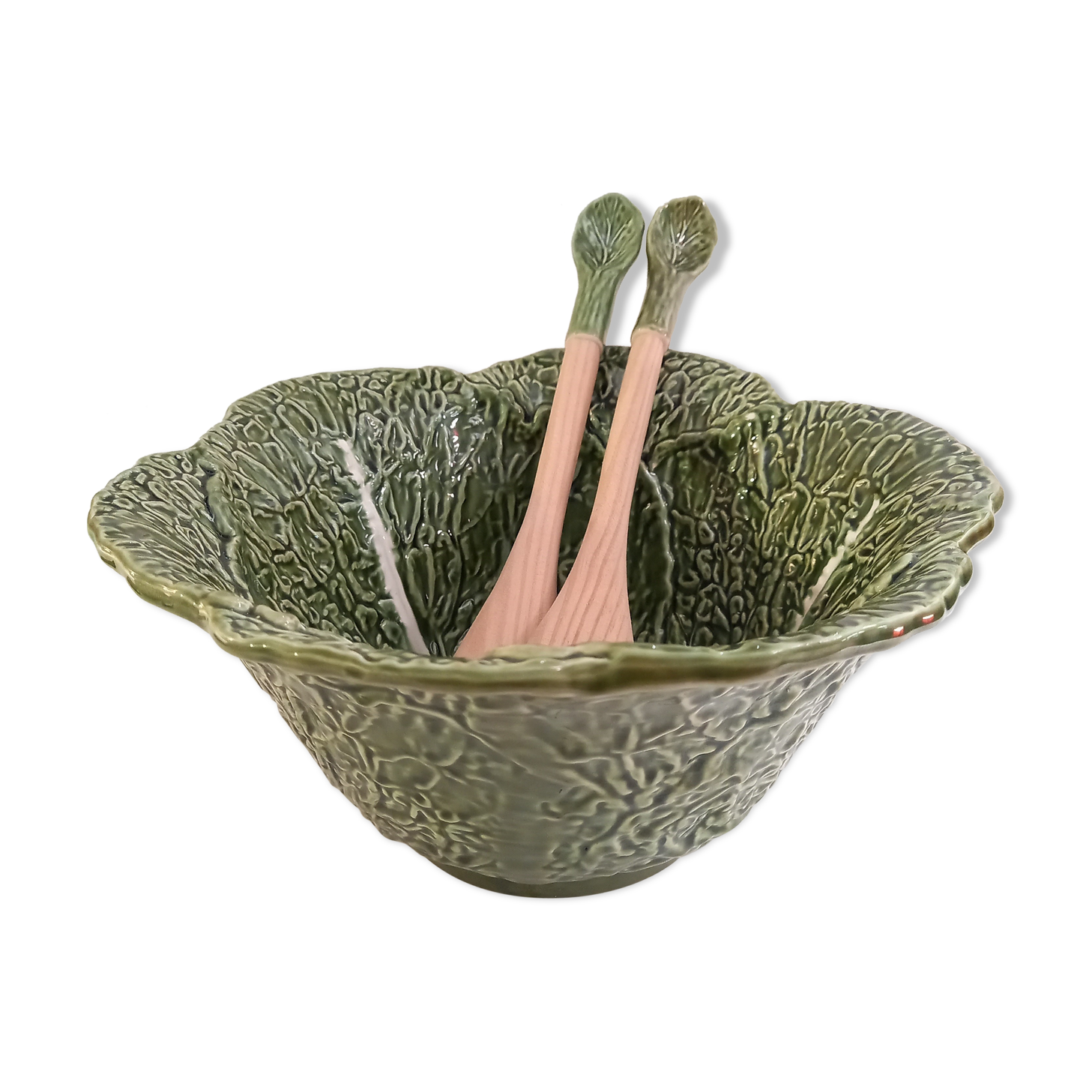 Vintage salad bowl in dabbling cabbage leaf and cutlery