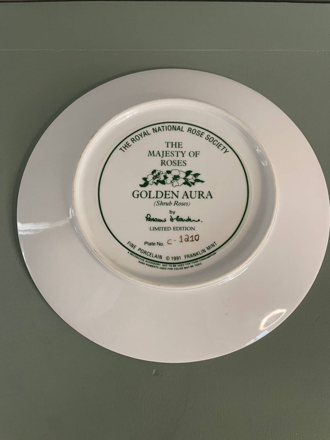 Franklin Mint Golden Aura decorative plate, porcelain