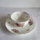 Antique Cup and Saucer in Porcelain with Hand-Painted Floral Decoration