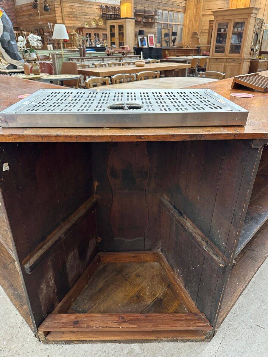 Large corner bar counter from the late 19th century.
